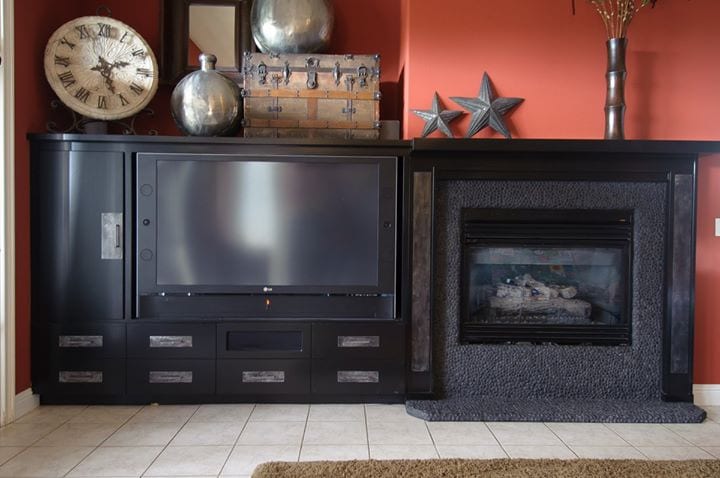Espresso-stained kitchen cabinetry around a built-in hearth